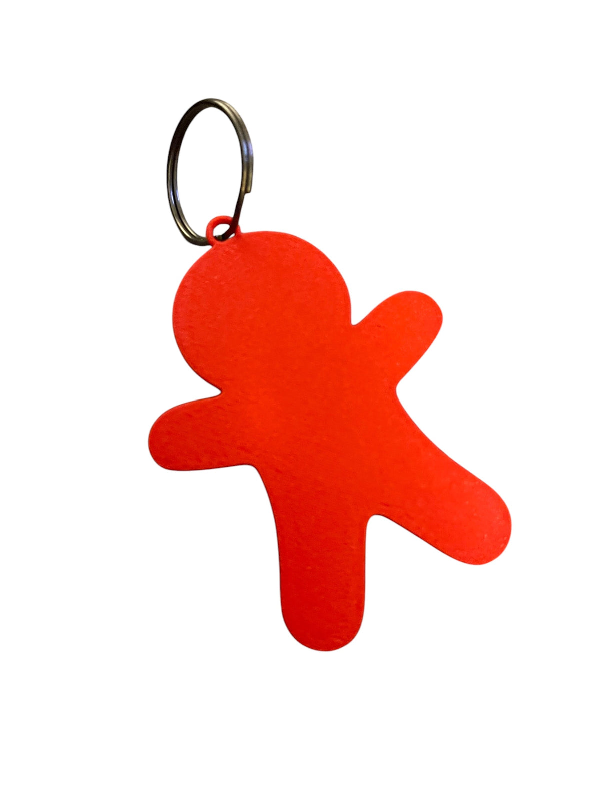red and black skeleton-shaped keychain or bag charm with a metal key ring, shown on a plain white background.