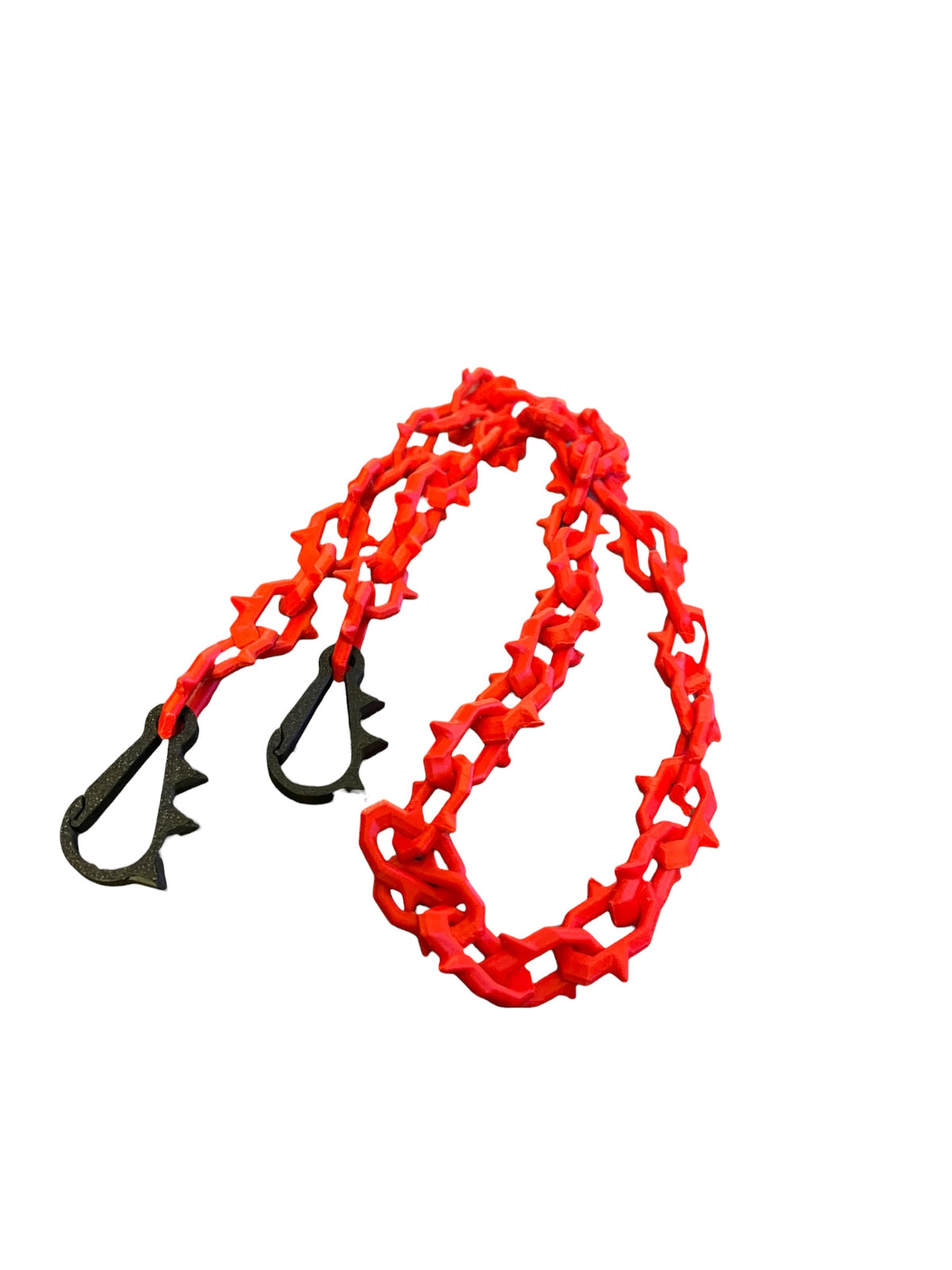 A bright red 3d printed wallet chain with black custom printed carabiners and spikey tips, photographed on a plain white background.
