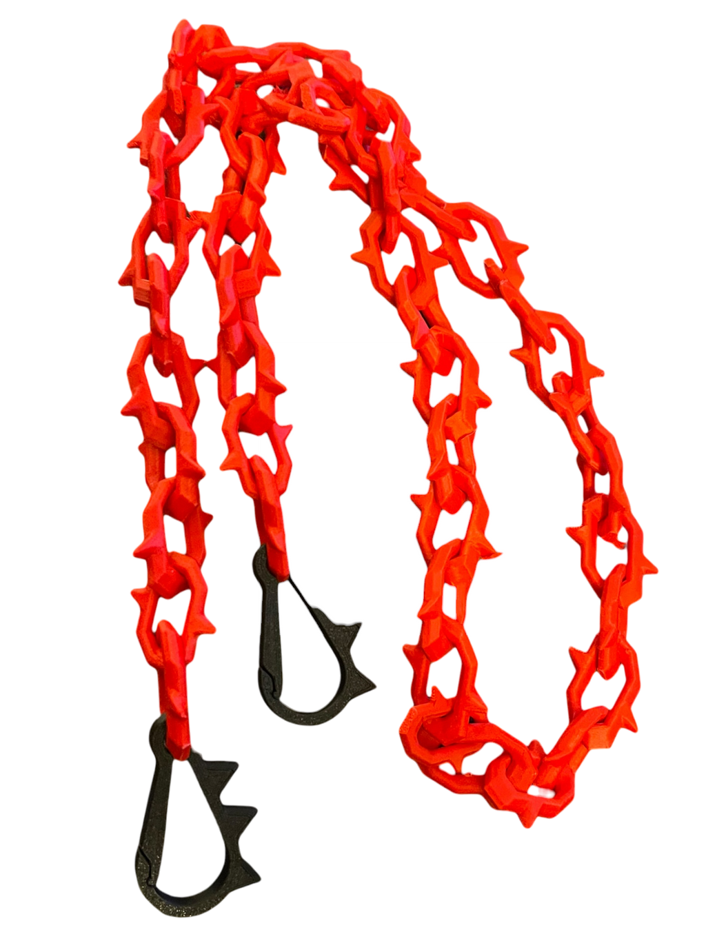 Bright red 3d printed plastic chain with black carabiner-style hooks on a plain white background.