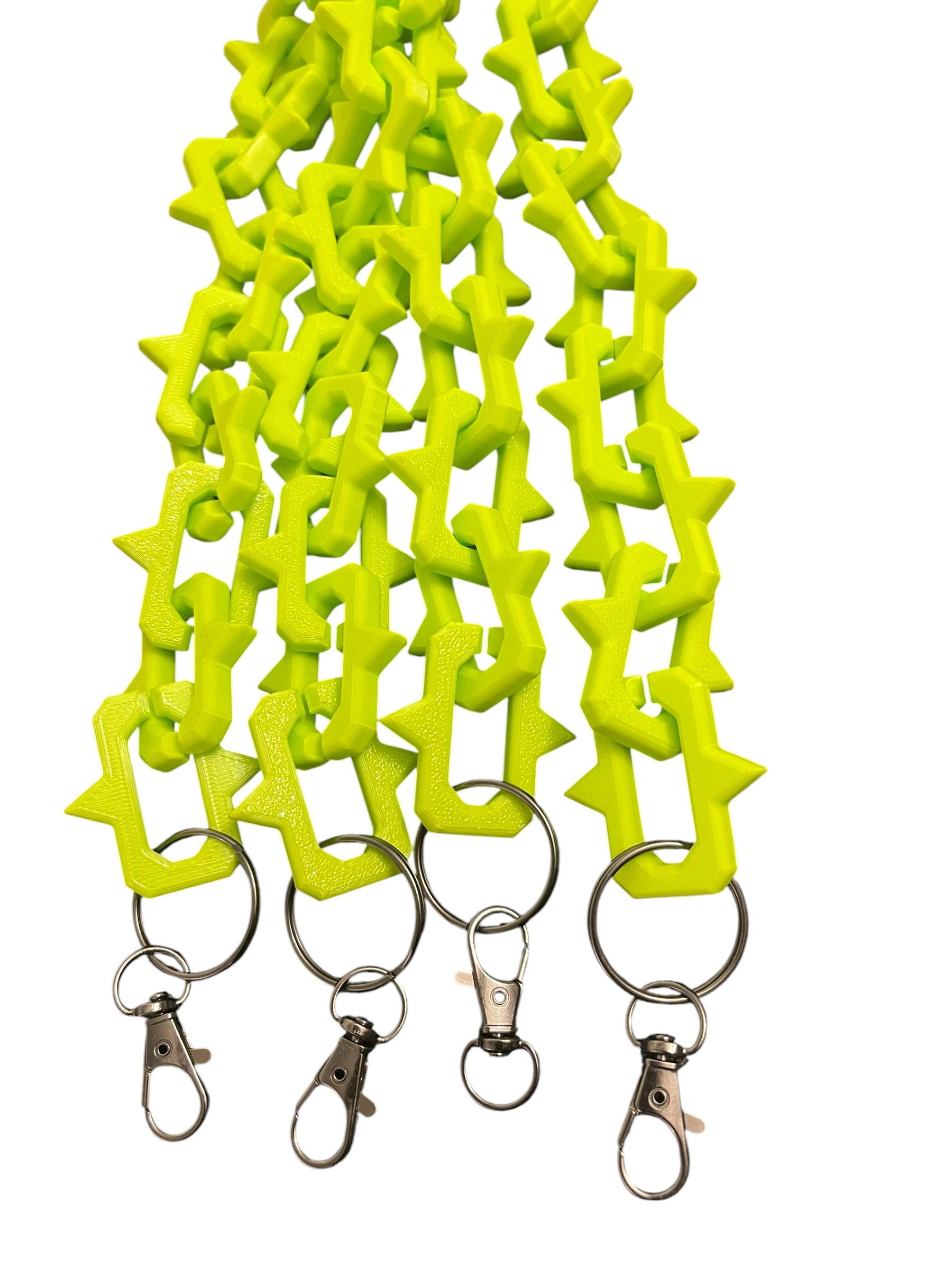 Bright neon green plastic keychain lanyards with interlocking studded links and gun metal color lobster clasp rings, shown on a plain white background.