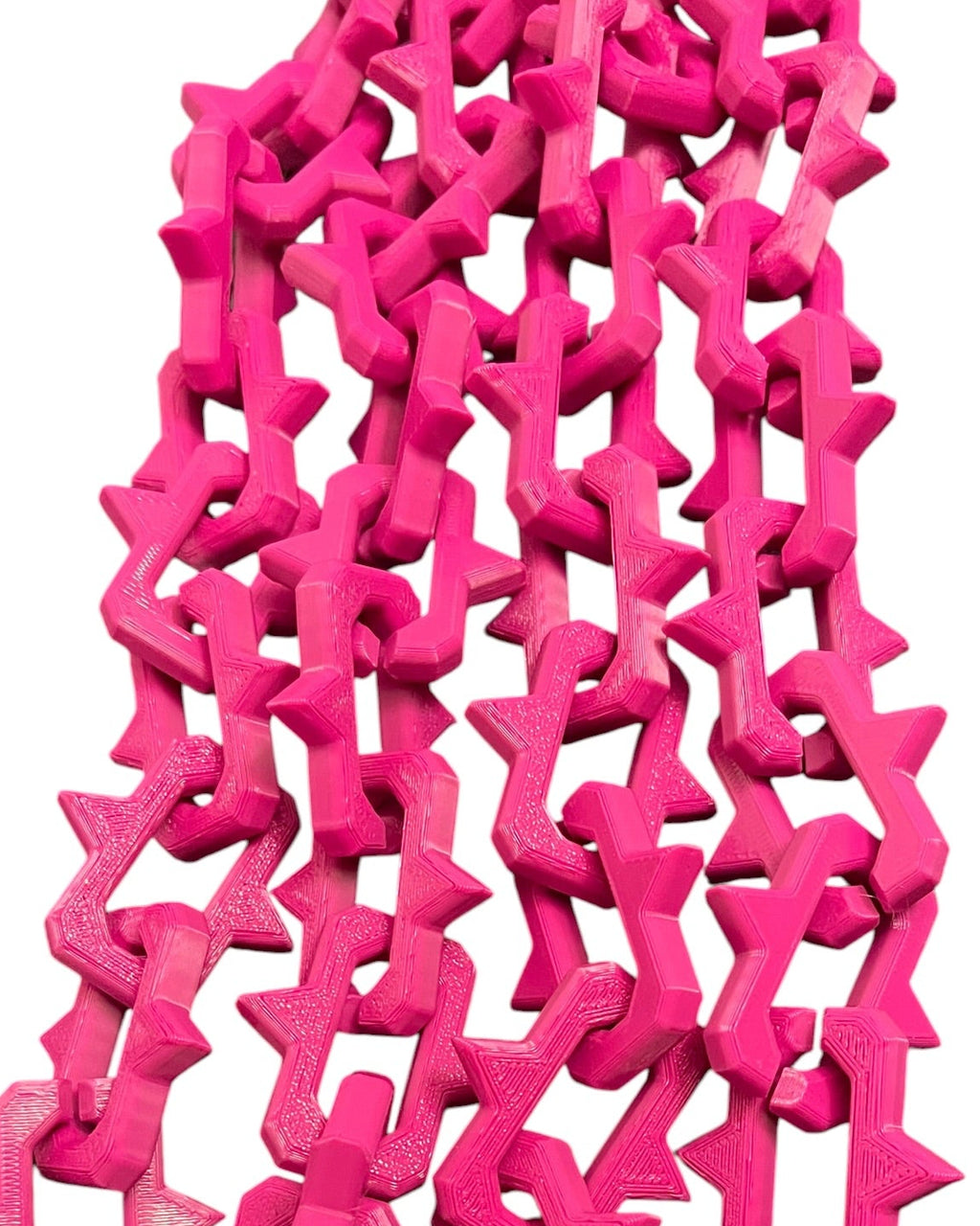 Bright pink plastic keychain lanyards with interlocking studded links and gun metal color lobster clasp rings, shown on a plain white background.