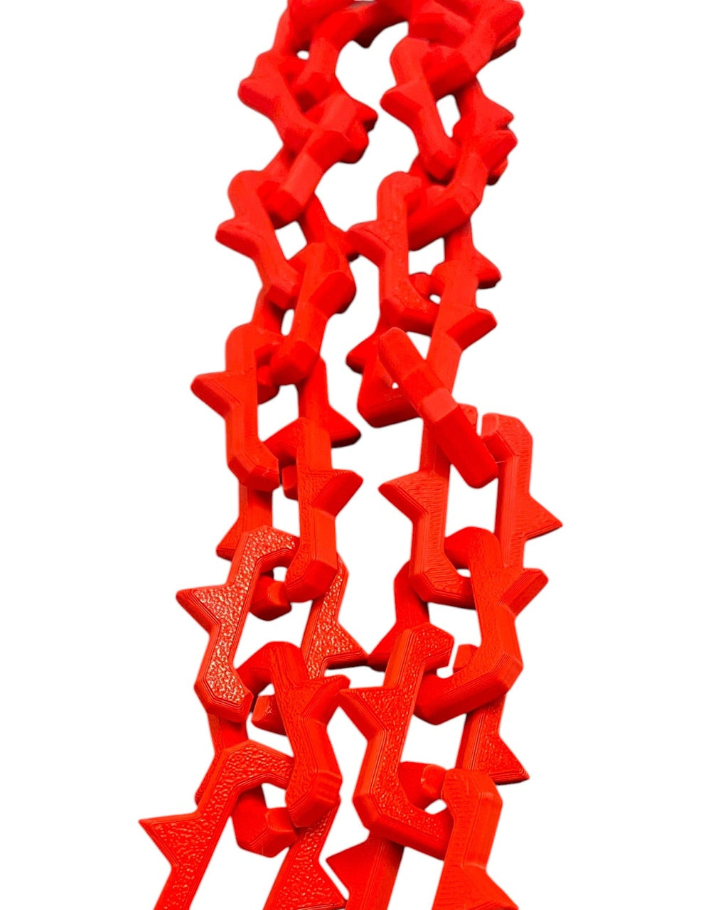 Bright red plastic keychain lanyards with interlocking studded links and gun metal color lobster clasp rings, shown on a plain white background.
