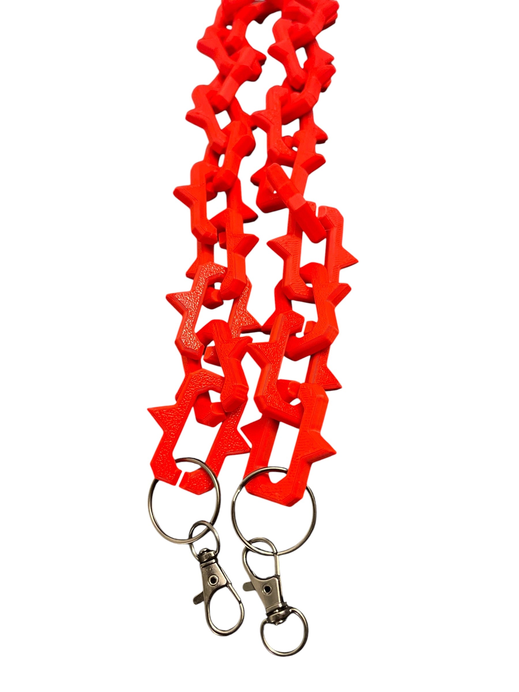 Bright red plastic keychain lanyards with interlocking studded links and gun metal color lobster clasp rings, shown on a plain white background.