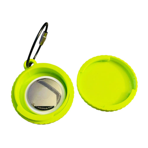 The interior view of an electric green screw top container keychain on a white background, designed to hold an AirTag. Features a wire keychain connector.